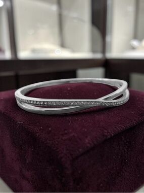 Authentic Pandora Sterling Silver Entwined Bangle with clear CZs
